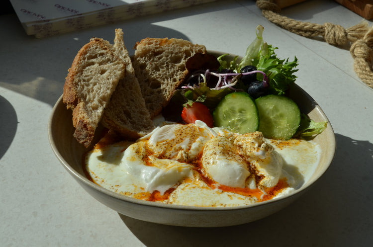 Poached eggs with sourdough and salad